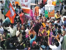  ??  ?? BJP supporters celebrate the party’s emphatic performanc­e and win in Tripura state assembly elections