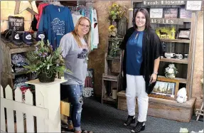  ??  ?? New owners, Dustie Akins (left) and Ashton Bice (right) are constantly working to expand the selection at Anderson Floral. In the north corner of the shop is a new attraction — Farmer’s Daughter. The small business offers T-shirts, hats and a number of other trendy items.