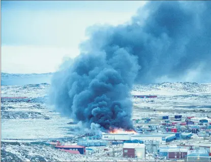  ?? CP PHOTO ?? A fire burns at a Northmart store in Iqaluit, Nunavut on Thursday.