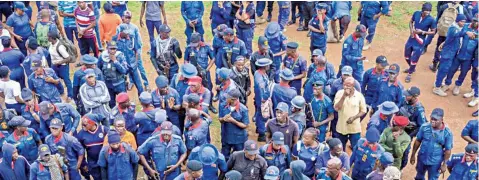  ?? ?? Personnel of the Nigerian Security and Civil Defence Corps ( NSCDC) posted to Ekiti State for the Governorsh­ip Election during their deployment to Polling Units in Ado- Ekiti... yesterday