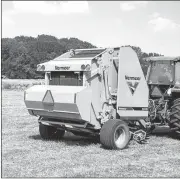  ??  ?? Vermeer 504N baler