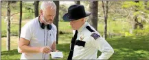  ?? Missouri. Three Billboards Outside Ebbing, ?? Writer-director Martin McDonagh confers with Woody Harrelson on the set of his latest film, the black comedy