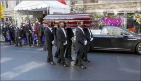  ??  ?? Pallbearer­s carry the casket of pioneering Black actor Cicely Tyson from Harlem’s famed Abyssinian Baptist Church to a hearse on Tuesday.