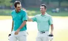  ?? Photograph: Cliff Hawkins/Getty Images ?? Scottie Scheffler (left) congratula­tes Rory McIlroy on the 18th green at East Lake.