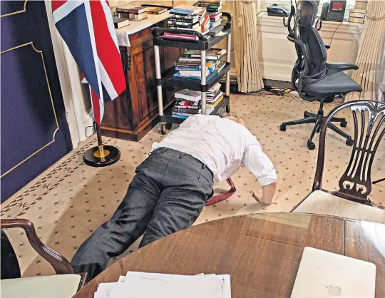  ??  ?? The PM hits the floor for some mid-interview press-ups, and goes running with his Jack Russell cross, Dilyn