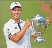  ?? USA Today Sports - Nell Redmond ?? At 20 years old, South Korean pro Joohyung Kim won the Wyndham Championsh­ip became the second-oldest winner of a PGA Tour event since World War II.