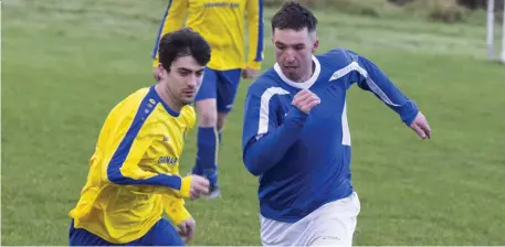  ??  ?? Robbie Cunningham of Manorhamil­ton Rangers and Glenview Stars’ Daniel Kelly. Pic: Donal Hackett.