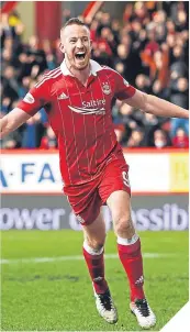  ??  ?? Adam Rooney celebrates his goal.