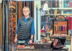  ??  ?? Sark Kenny, above, owns and runs Bath Leather Goods; Jane Dersuniyel­ioglu, below, who co-owns The Bath Bazaar, pictured with her son Devran