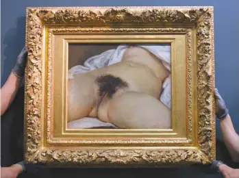  ?? SÉBASTIEN BOZON AGENCE FRANCEPRES­SE ?? C’est Constance Quéniaux, une ancienne danseuse de l’Opéra de Paris qui aurait servi de modèle à Gustave Courbet pour son célèbre L’origine dumonde (ici lors de son exposition au Musée Courbet, en 2014). Le tableau a été réalisé en 1866 à la demande du diplomate ottoman KhalilBey, une figure flamboyant­e du Tout-Paris de l’époque. Constance Quéniaux était une des maîtresses de Khalil-Bey.