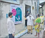  ??  ?? Health workers raise awareness about Covid vaccinatio­n in a village in Thane on Friday.