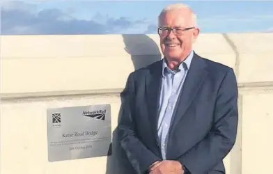  ??  ?? Effort Stirling MSP Bruce Crawford next to plaque on new Kerse Bridge