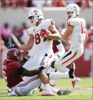  ?? AP PHOTO BY BRYNN ANDERSON ?? Alabama defensive back Hootie Jones tackles Fresno State tight end Kyle Riddering in the first half of an NCAA college football game, Saturday, in Tuscaloosa, Ala.