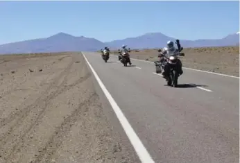  ??  ?? The Kopanskys on the road in Argentina, just after crossing the border from Chile, partway into the Andes.