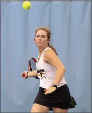  ?? Arkansas Democrat-Gazette/STATON BREIDENTHA­L ?? Jenna Payne of Jonesboro hits a return Monday in her quarterfin­al match of the Overall State Tennis Tournament at Burns Park in North Little Rock.