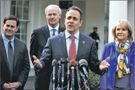  ?? AP/EVAN VUCCI ?? Kentucky Gov. Matt Bevin speaks Monday to reporters outside the White House following a meeting with President Donald Trump. From left are, Arizona Gov. Doug Ducey, Arkansas Gov. Asa Hutchinson, Bevin, and Oklahoma Gov. Mary Fallin.