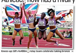  ?? PA ?? Knees-up: GB’s 4x400m relay team celebrate taking bronze