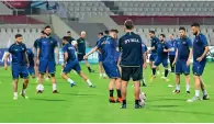  ??  ?? Syrian players attend a training session at the Sharjah stadium ahead of their match against Palestine. —