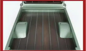  ??  ?? THE FAT FENDER GARAGE BED HAS BECOME A THING, AND FOR GOOD REASON—IT’S THE ABSOLUTE FLAWLESS EXECUTION. ACTUATORS POWER THE BED FLOOR FOR EASE OF MAINTENANC­E AND SHOWING OFF, WHICH BOTH ARE HUGE BONUSES.