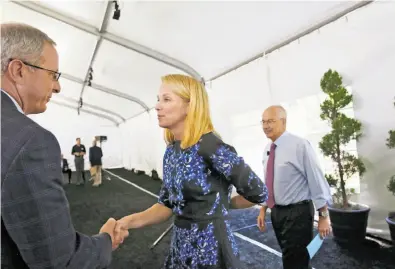  ?? Lea Suzuki / The Chronicle ?? Marissa Mayer, with Stanford Directors’ College guests, says loud complaints of sexism deter girls from tech.