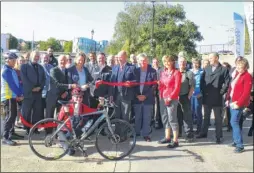  ??  ?? Cycle campaigner Angelo Martinez; Tracey Crouch MP cuts a ribbon to reopen the towpath along the Medway in Maidstone