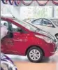  ?? MINT FILE ?? Though most automakers have passed on the GST benefits to customers, they saw a rough sales weather in June as customers delayed their vehicle purchases.