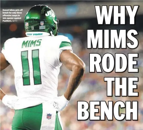  ?? GETTY ?? Denzel Mims gets off bench for only three offensive snaps in Jets opener against Panthers.