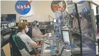  ?? KATHERINE FREY/WASHINGTON POST ?? The flight control room at the Space Telescope Science Institute in Baltimore. Scientists here will watch the launch of the James Webb telescope, scheduled for Christmas morning.