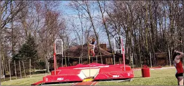  ?? David Jacobs/sdg Newspapers ?? A Shelby pole vaulter practices skills at the Whippets athletic facility on March 13.