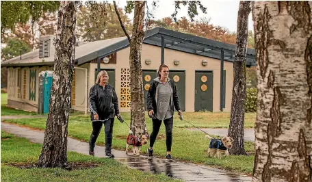  ?? PHOTO: JOHN KIRK-ANDERSON/FAIRFAX NZ ?? Lyn Henderson, left, and Megan Oliver at St Albans Park, where the toilet block remains closed six years after the earthquake­s.