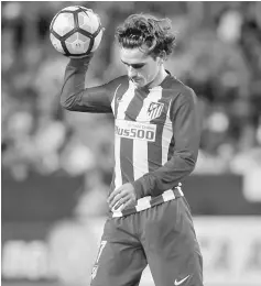  ??  ?? Atletico Madrid’s Antoine Griezmann reacts during the La Liga match against Malaga at La Rosaleda Stadium in Malaga, Spain in this April 1 file photo. — Reuters photo