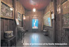  ?? ?? A video of performanc­e art by Kawita Vatanajyan­kur.