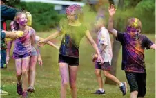  ??  ?? Year 5 student Tiara Avery was enjoying herself at the colour fun run yesterday.