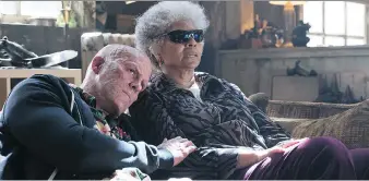  ?? JOE LEDERER ?? Ryan Reynolds, left, and Leslie Uggams star in Deadpool 2, which has taken over the weekly global box office’s top spot, beating its closest competitor Solo: A Star Wars Story.