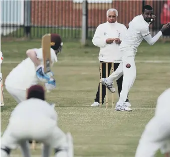  ??  ?? Washington’s Malinga Surappulig­e bowls against Seaham Harbour on Saturday. Pictures by Tim Richardson.