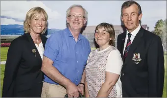  ??  ?? The Dundalk Open Scotch Mixed Foursomes took place on Sunday and pictured at the presentati­on were (l to r) Lady Captain Maeve Ahern, Larry & Mary Steen (winners) and Captain Mickey Coburn.