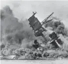  ?? AP ?? In this photo provided by the U.S.
Navy, smoke rises from the battleship USS Arizona as it sinks during the Japanese attack on Pearl Harbor, Hawaii, Dec. 7, 1941. In December, Harry Chandler returned to Pearl Harbor for the 82nd anniversar­y.
There, he and five other survivors were honored with a parade. While he welcomed the honors, the visit brought back painful memories.