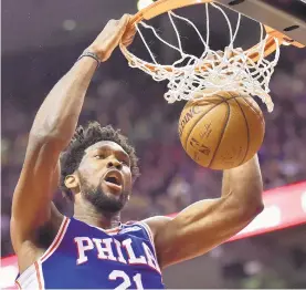  ?? FRANK GUNN/AP FILE PHOTO ?? Philadelph­ia 76ers center Joel Embiid is one of a new wave of foreign-born players who have been making an impact in the NBA in recent seasons.