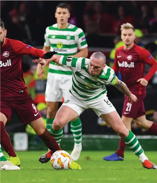  ??  ?? Salzburg, but Scott Brown (above) was back to his battling best as the Bhoys slumped to defeat at Parkhead