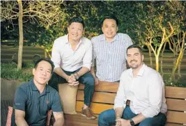  ?? HAWKERS ASIAN STREET FOOD ?? The founders of Hawkers Asian Street Food (from left to right) Kin Ho, Wayne Yung, Allen Lo and Kaleb Harrell. The Orlando-based restaurant concept’s name was inspired by the street food vendors that the founders encountere­d during their travels across Southeast Asia.