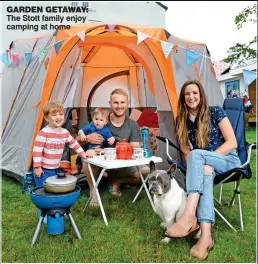  ??  ?? GARDEN GETAWAY: The Stott family enjoy camping at home