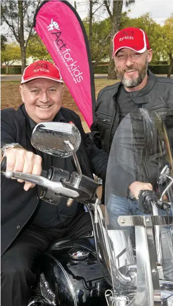  ?? PHOTO: NEV MADSEN ?? KIDS BENEFIT: Raising money is ACT For Kids CEO Dr Neil Carrington (left) and ACT for Kids ambassador and dealer principal of Mercedes-Benz Brisbane Shane Parkins who were in Toowoomba yesterday.