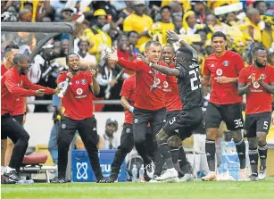  ?? Picture: GALLO IMAGES/LEFTY SHIVAMBU ?? ALL PASSION: Orlando Pirates’ Innocent Maela celebrates his goal with coach Milutin Sredojevic and assistant coach Rulani Mokwena, left, against Kaizer Chiefs. Sredojevic believes Mokwena is destined for greatness.