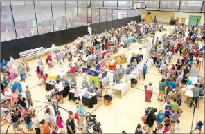  ??  ?? A total of 1,340 participan­ts received assistance at the 21st annual A Day of Caring at Harding University’s Ganus Athletic Center. The medical mission helps uninsured and underinsur­ed residents of White County and surroundin­g areas.