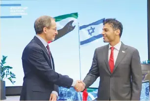 ?? (Eyal Marilius) ?? UAE AMBASSADOR to Israel Mohamed Al Khaja (right) meets with CEO of Start-Up Nation Central Prof. Eugene Kandel.