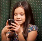  ??  ?? We give children phones to protect them — but there are risks too