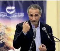  ??  ?? Tariq Ramadan, à un meeting de l’Union des Organisati­ons islamiques de France, au Bourget, en 2012.