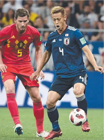  ?? Picture: AFP ?? CHALLENGE: Belgium's Jan Vertonghen (left) marks Keisuke Honda in the World Cup.