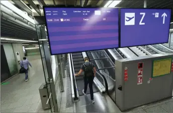  ??  ?? A screen showing Lufthansa flight Le P42 to Tianjin, China Ethe first post-lockdown flight departing Europe for ChinaF is pictured at the airport in Frankfurt am jain, western dermany. — AFP photo