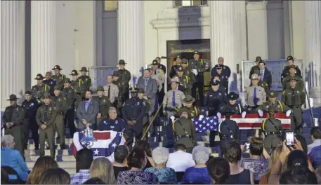  ?? JULIO MORALES PHOTO ?? Federal, state and local law enforcemen­t officials line the steps of the El Centro courthouse during the ninth annual Imperial Valley Law Enforcemen­t Memorial on Friday. Those standing represent the 39 law enforcemen­t officials who have died in the...